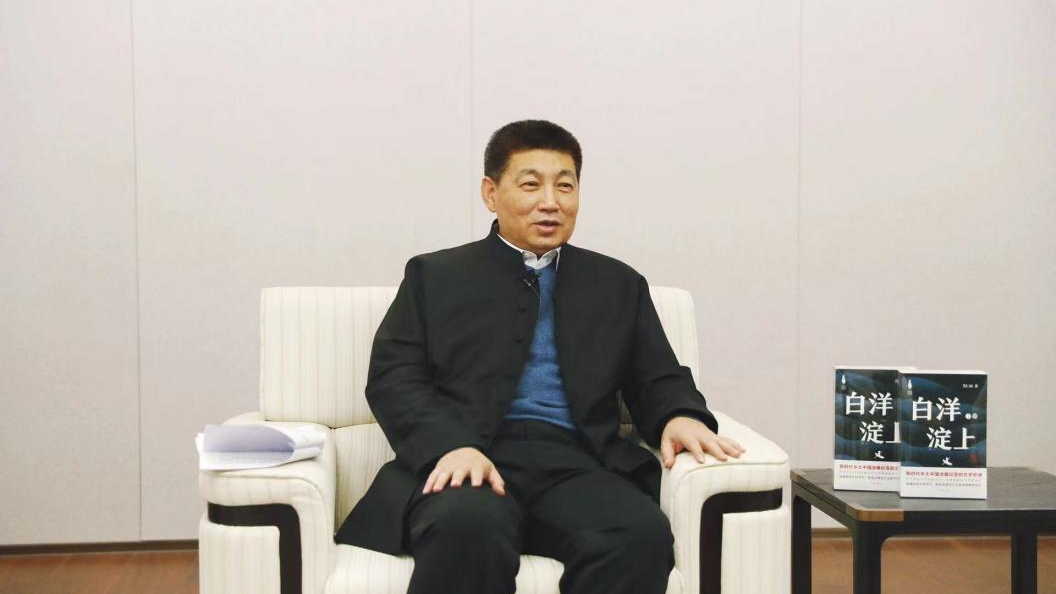 关仁山：在太阳集团1088vip新区的画卷中眺望文学的风景